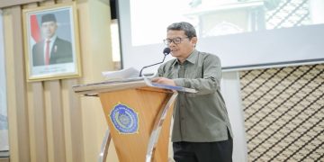 Ketua Panitia Agus Susanto, S.T., M.T. menyampaikan laporan. Foto: Ist.
