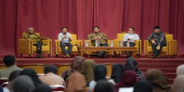 Seminar Nasional yang diselenggarakan Pusat Keunggulan IPTEK Center for Fintech and Banking di Kampus UNS Solo, Kamis (18/6/2026). Foto: Ist.