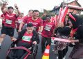 Gubernur Jawa Tengah, Ahmad Luthfi mengikuti Soekarno Run 2026 di Solo sambil mendorong kursi roda putranya, Mohammad Alif Daffa, Minggu (28/6/2026). Foto: Ist.