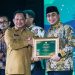 Wakil Gubernur Jawa Tengah, Taj Yasin Maimoen, yang mewakili Gubernur Ahmad Luthfi pada malam penganugerahan yang diselenggarakan Komite Nasional Ekonomi dan Keuangan Syariah (KNEKS) di Auditorium Bank Mega, Jakarta, Senin (6/7/2026). Foto : Ist.