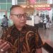 Ketum Senkom Mitra Polri, Prof Dr H Katno Hadi SE, MM, MH memberikan keterangan pers di Bandara Adi Soemarmo, Solo, Minggu (9/8/2026) usai dikukuhkan sebagai guru besar di Asean University International, Malaysia. Foto: Ist.