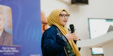 Plt Asisten Adminitrasi Umum Sekda Kabupaten Balangan, Bali, Hj. Ernawati, S.STP., M.M menjadi narasumber pada Kuliah Umum, "Pengembangan Talenta, Inovasi dan Enterpreneurship, di Kampus BIM University, Jumat (21/8/2026). Foto: Ist.