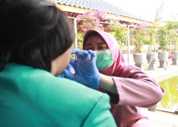 Tim Program Penguatan Kapasitas Caption: Tim PPK Ormawa PK IMM Al-Ghozali Fakultas Psikologi UMS menghadirkan program Pojok Harmoni  di Desa Catur, Kecamatan Sambi, Kabupaten Boyolali. Foto: Ist.