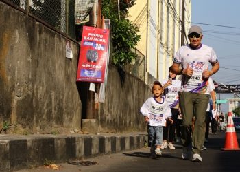 Pelari cilik, Khaizuran Abqory Abrisam Al Hafidzh saat mengikuti Edu Fun Run FKIP UMS, Minggu (13/9/2026). Foto: Ist.