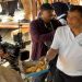 Gubernur Ahmad Luthfi membagikan gorengan saat dialog dengan warga di Timbulsloko Demak. Foto: Ist.